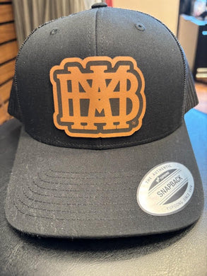 Black snapback trucker hat with faux leather waffle