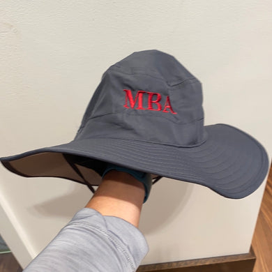 Gray bucket hat with Cardinal MBA